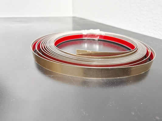 Stainless steel self adhesive strip
