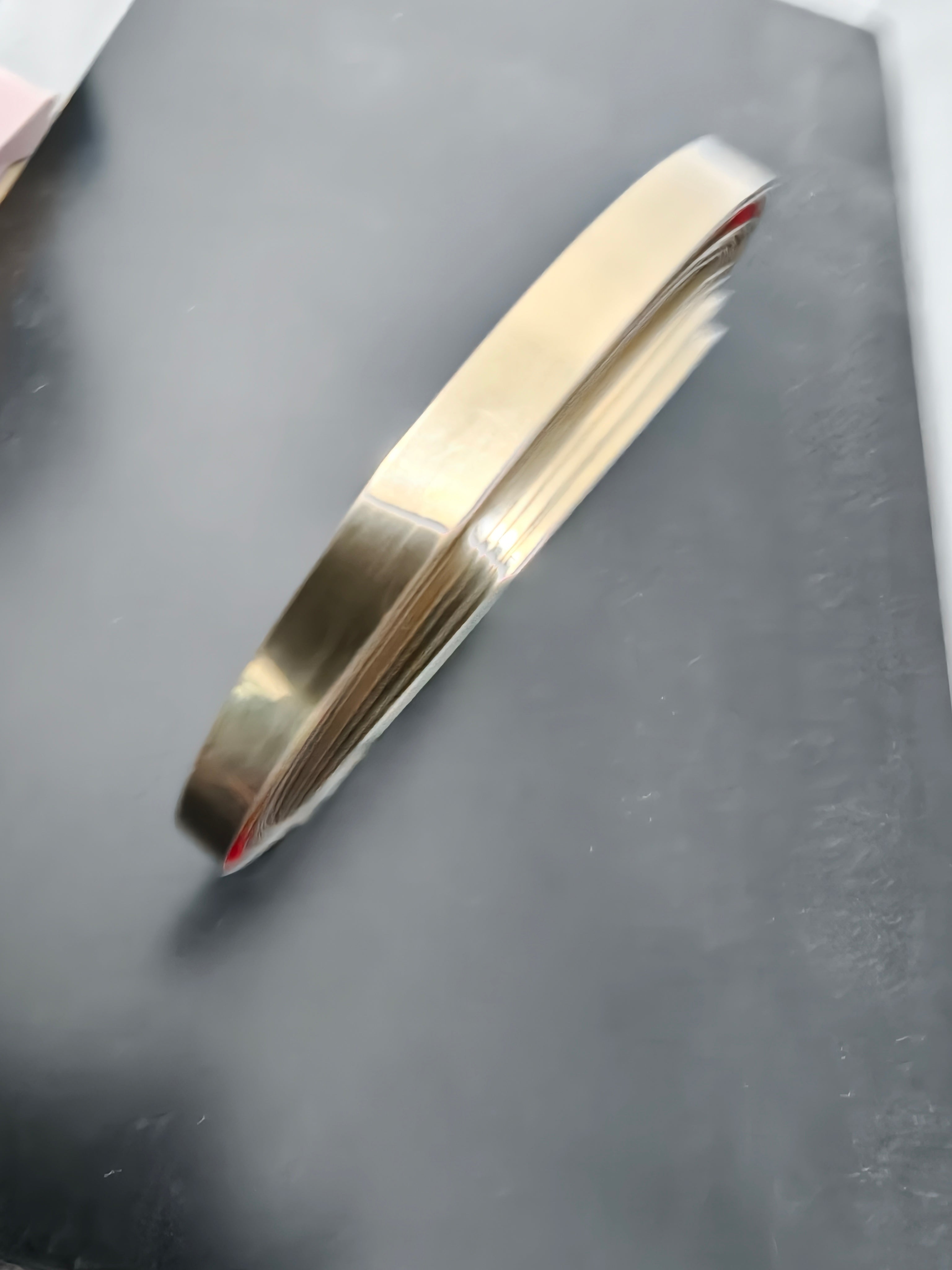 Stainless steel self adhesive strip