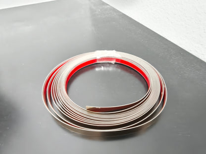 Stainless steel self adhesive strip